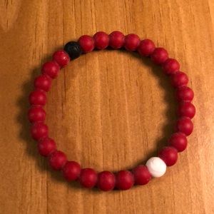 Red Lokai bracelet.